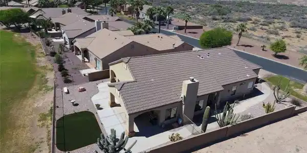 Image 2: An aerial perspective reveals a desert oasis commu