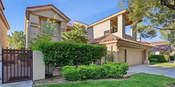 Image 3: Mature landscaping, lush trees exterior of the hom