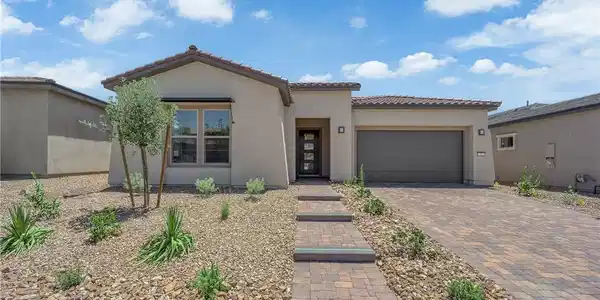 Image 2: A desert-friendly landscape accents the appealing