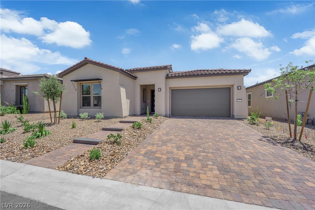 Image 3: A desert-friendly landscape surrounds this charmin