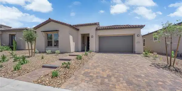 Image 3: A desert-friendly landscape surrounds this charmin