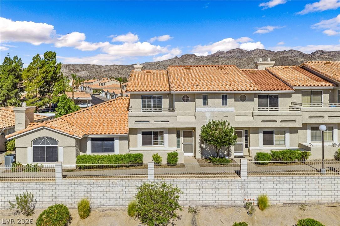 Image 2: Terracotta-tiled roofs grace this multi-level home