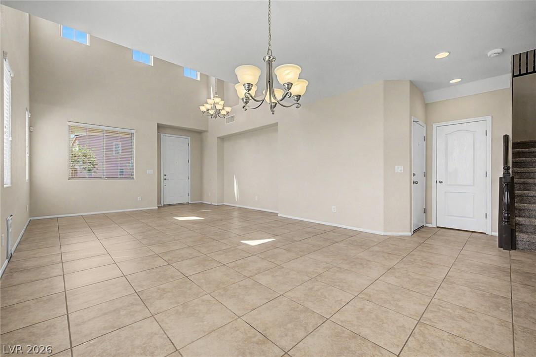 Image 4: Lofty ceilings and tile flooring enhance this vers