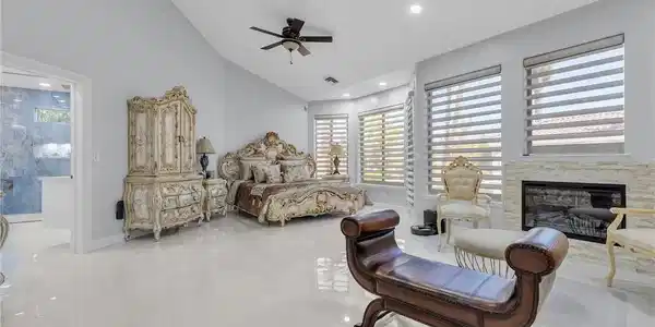 Image 3: Gleaming tile floors and vaulted ceilings define t