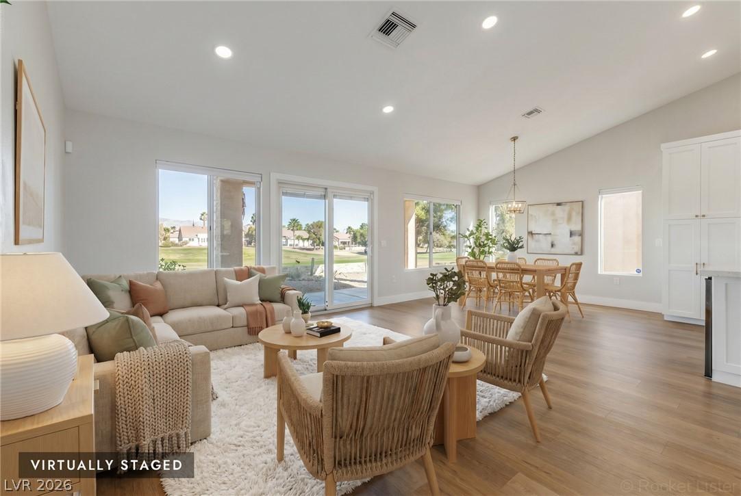 Image 2: Step into a sun-filled great room with soaring cei
