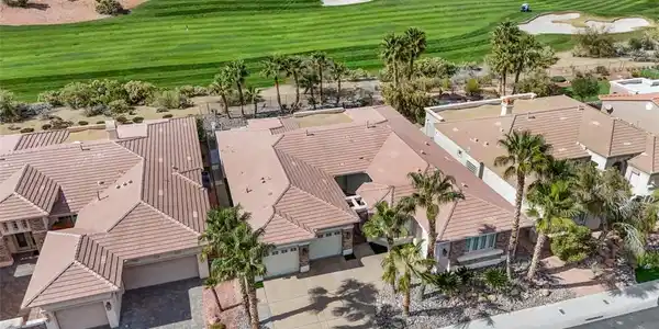 Image 2: Tiled roofs and palm trees characterize this neigh