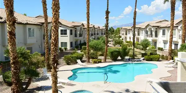 Image 2: Two refreshing community pool & spas invite relaxa