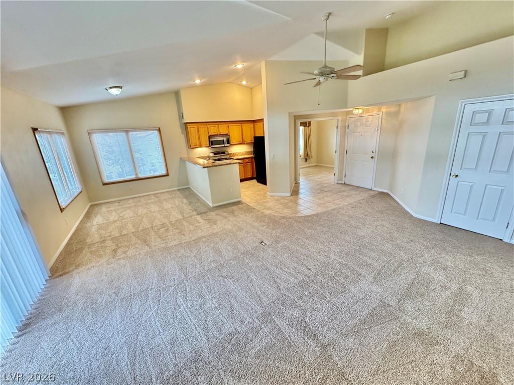 Image 4: An open floorplan seamlessly connects the living a