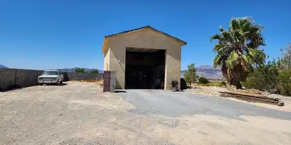 Image 2: View of RV Garage 
outdoor structure with a mount