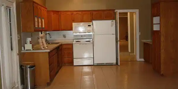 Image 4: Kitchen featuring light countertops, white applian
