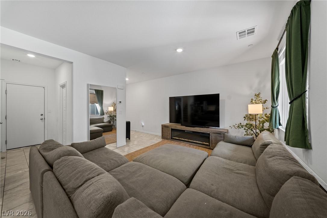 Image 3: A spacious living room designed for comfort and mo