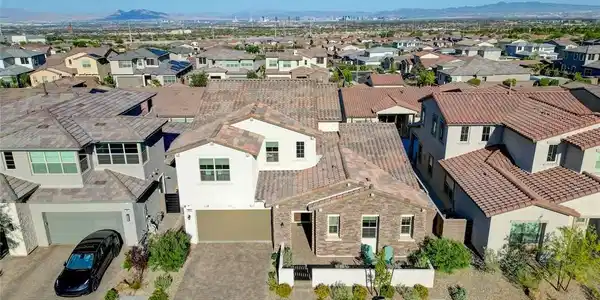 Image 4: An aerial perspective reveals a charming residence