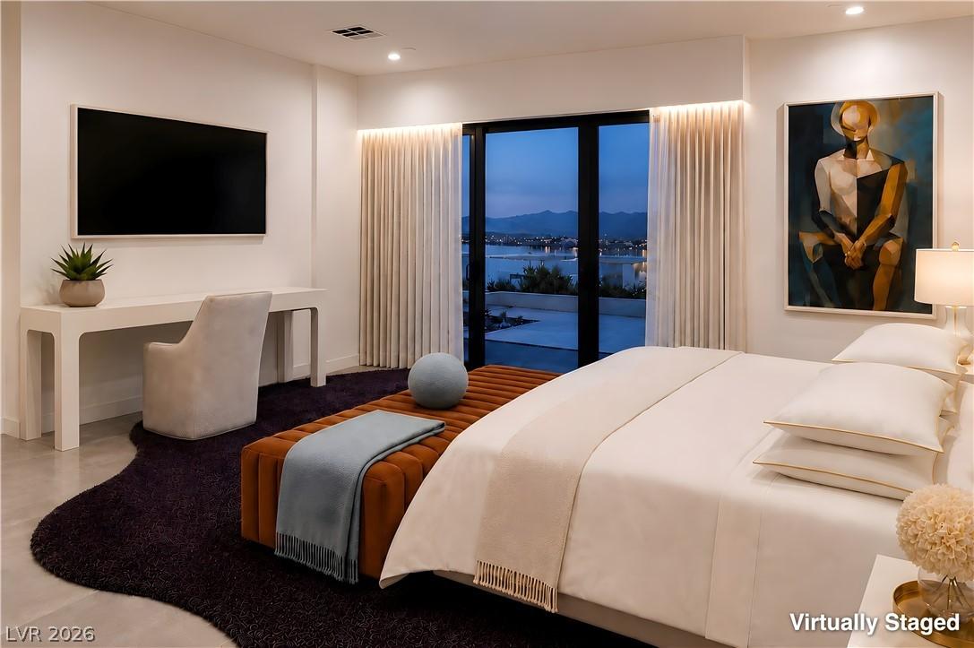 Image 1: An inviting bedroom with floor-to-ceiling windows