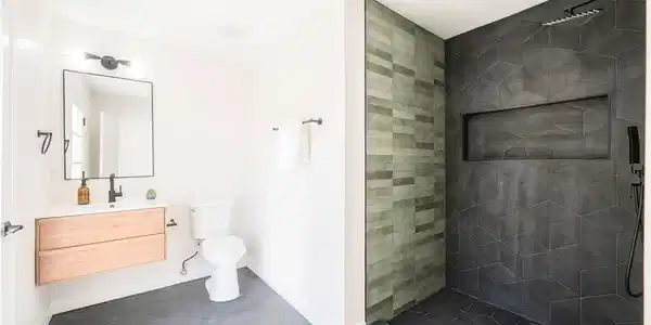 Image 2: A well-appointed bathroom features a sleek vanity,