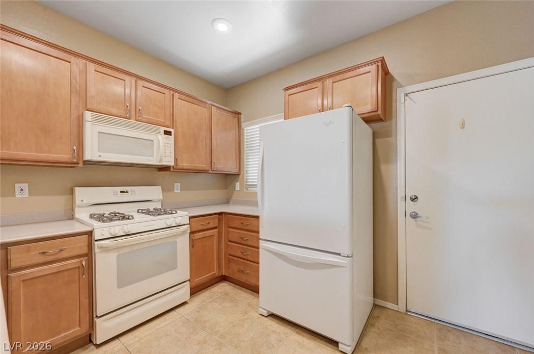 Image 3: A well-appointed kitchen offering modern appliance