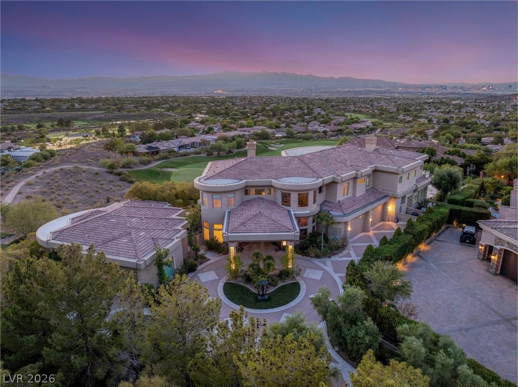 Image 2: Grand estate with a circular driveway and ample pa