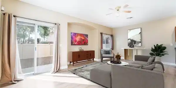 Image 3: Sliding glass doors open directly to the backyard