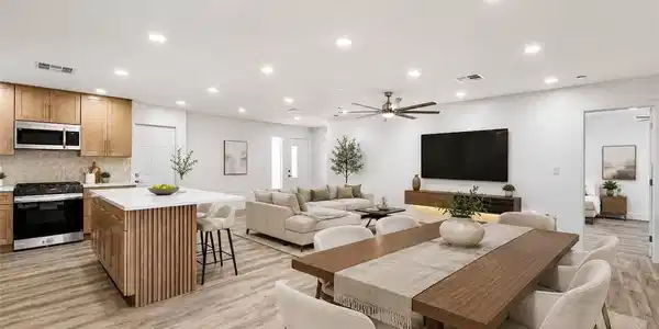 Image 4: An open-concept living space integrates a stylish