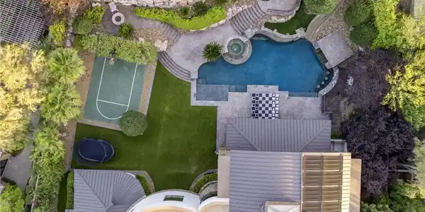Image 4: An aerial perspective reveals a luxurious outdoor