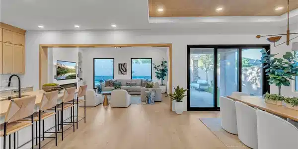 Image 3: Warm wood accents complement the open-concept layo