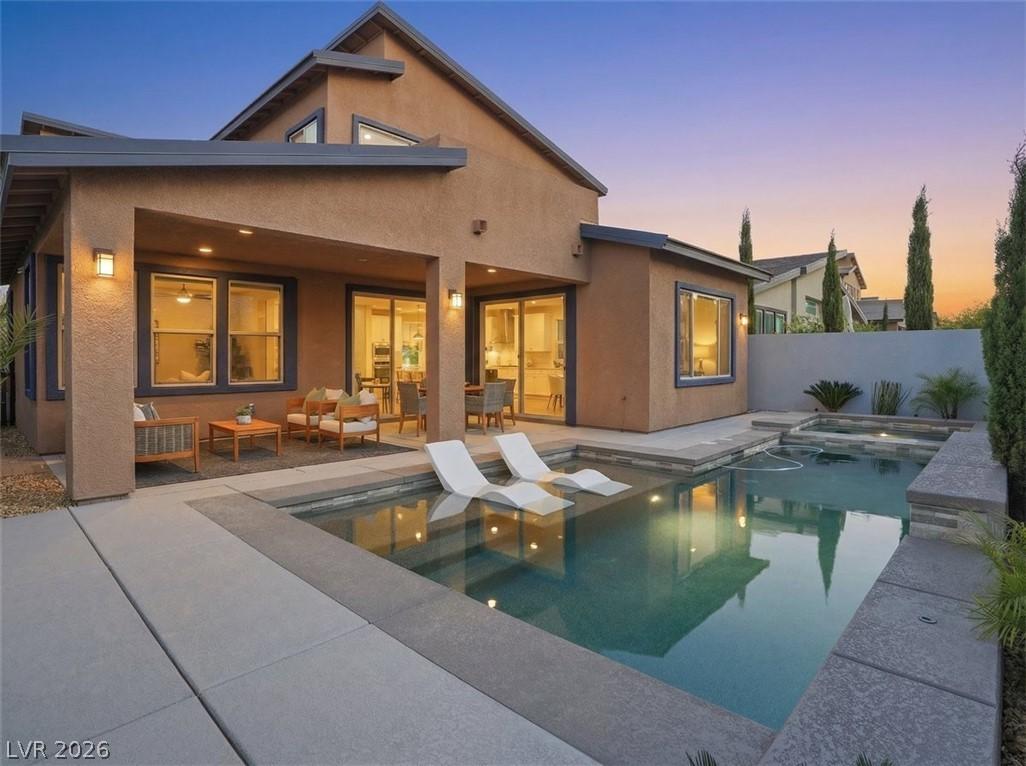Image 2: This captivating exterior features a inviting pati