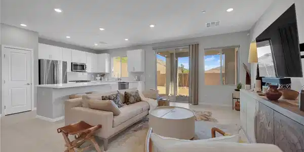 Image 4: A versatile open-concept living space seamlessly c
