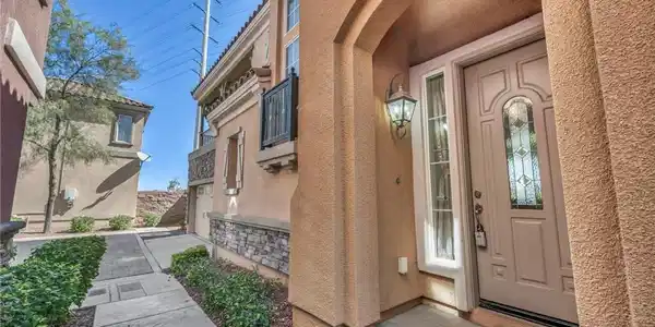 Image 3: An inviting entryway welcomes guests with timeless
