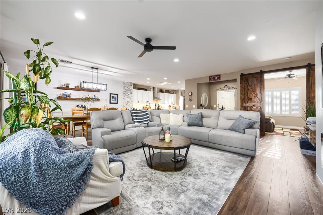 Image 3: An inviting open-concept living space features woo