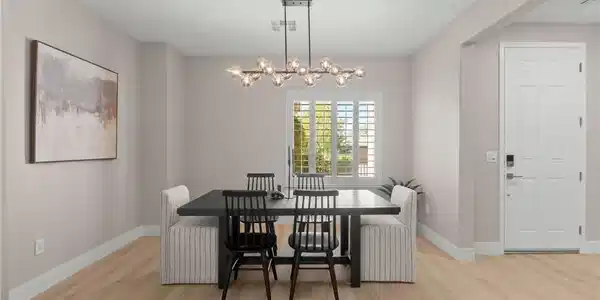 Image 4: Smooth wood flooring and clean walls frame an eleg