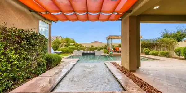 Image 3: A shaded patio transitions seamlessly to an inviti