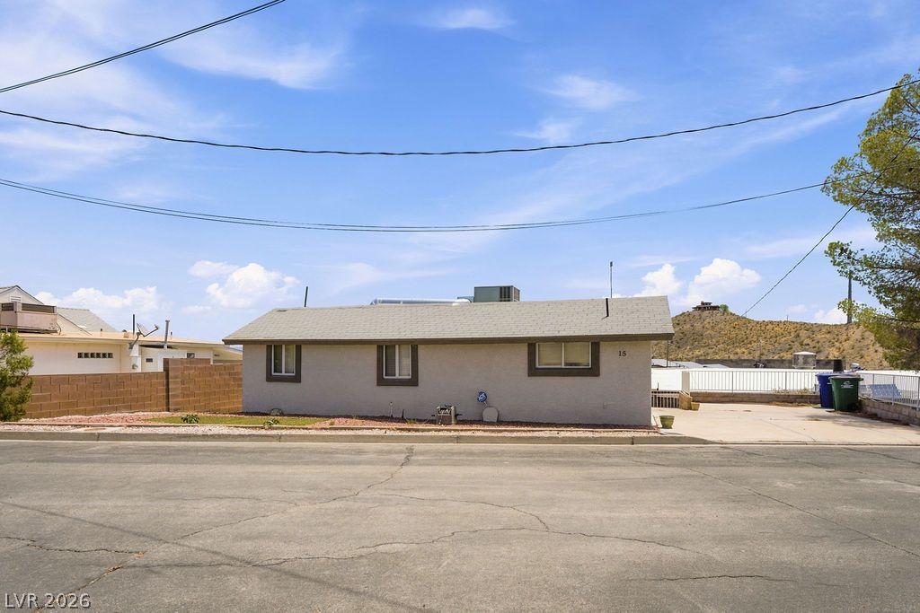 Image 2: Simple dwelling with a practical exterior, nestled