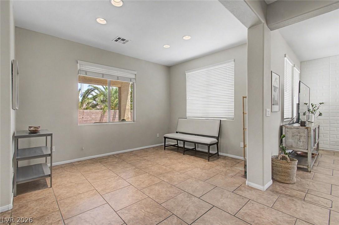 Image 3: formal dining room right off of the kitchen.