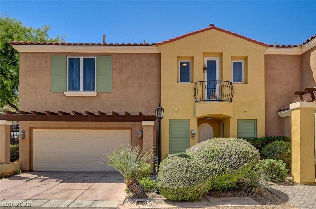 Image 3: A charming facade features Mediterranean-inspired