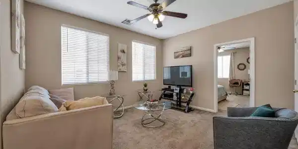 Image 4: A comfortable living space offers ample light and