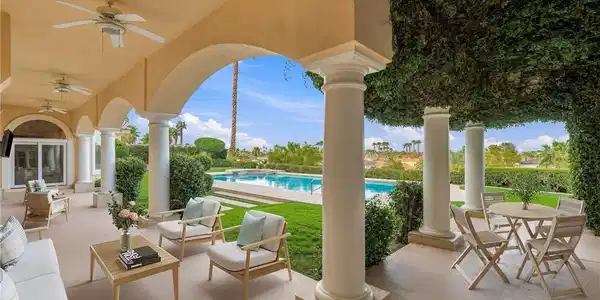 Image 2: Arched loggia columns frame sweeping views of the