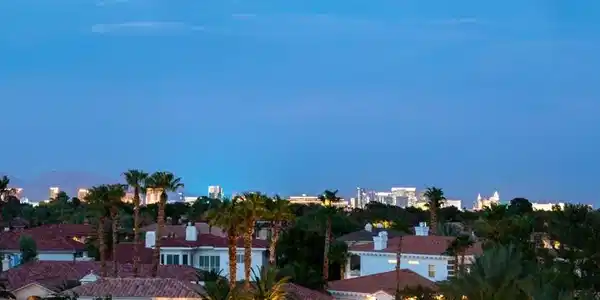 Image 3: Glittering city lights outline the skyline from th