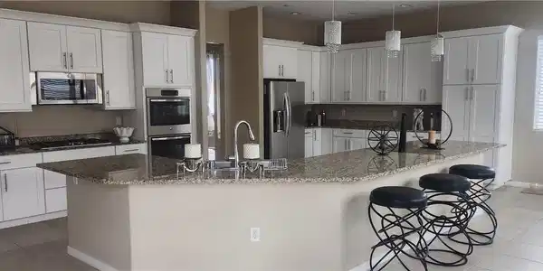 Image 4: Kitchen featuring light tile patterned flooring, w