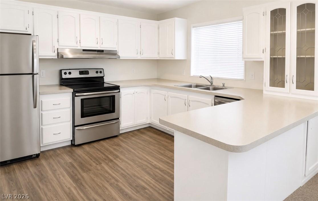 Image 4: A well-equipped kitchen featuring stainless steel