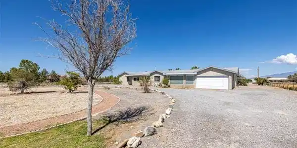 Image 2: This spacious property features a durable block co