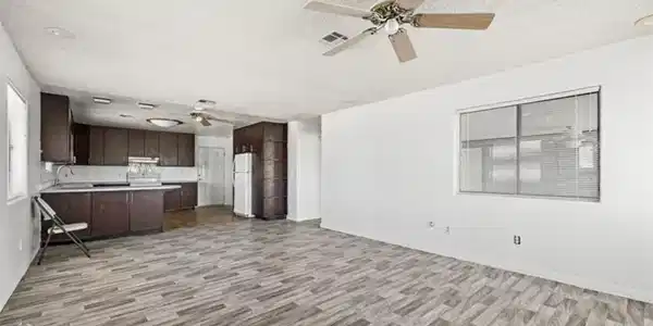 Image 3: This bright, open concept living space features a