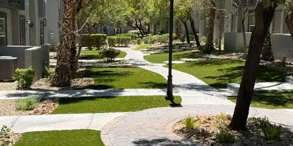 Image 4: Winding pathways through green spaces lead to tran