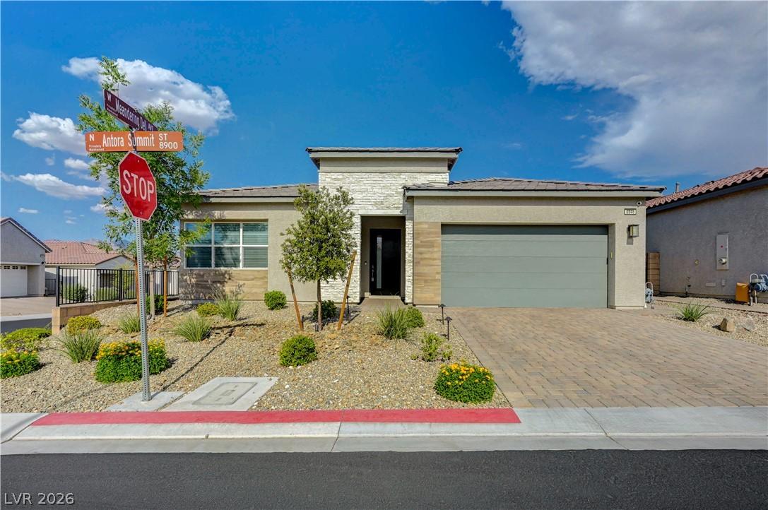 Image 3: A contemporary desert dwelling featuring a paved d