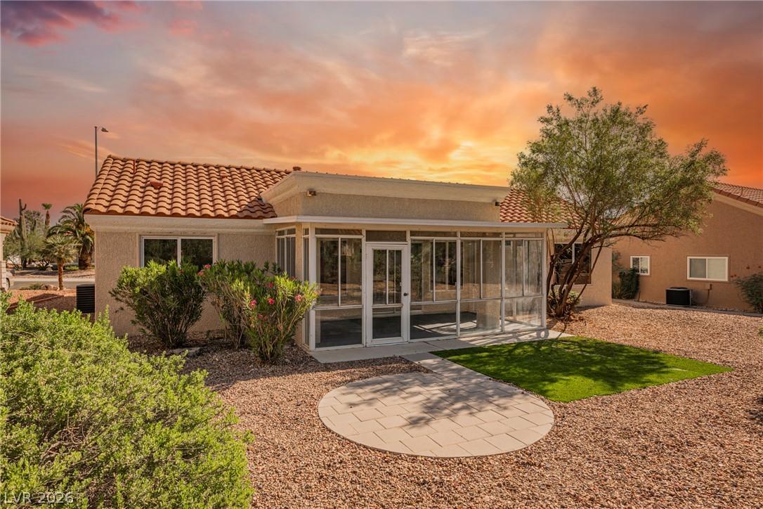Image 4: An enclosed patio offers a peaceful retreat for ou