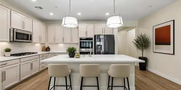 Image 4: VIRTUALLY STAGED- Gleaming stone countertops and m