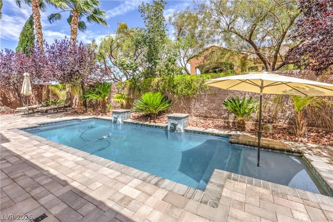 Image 2: Relax in your private oasis with a sparkling pool,