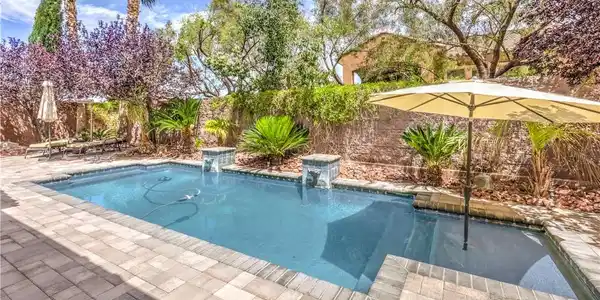 Image 2: Relax in your private oasis with a sparkling pool,