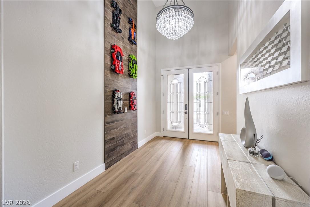 Image 4: Enter into a bright foyer featuring beautiful floo