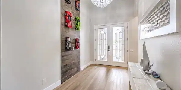 Image 4: Enter into a bright foyer featuring beautiful floo