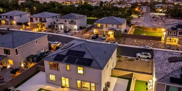 Image 2: An aerial perspective reveals a modern home with s