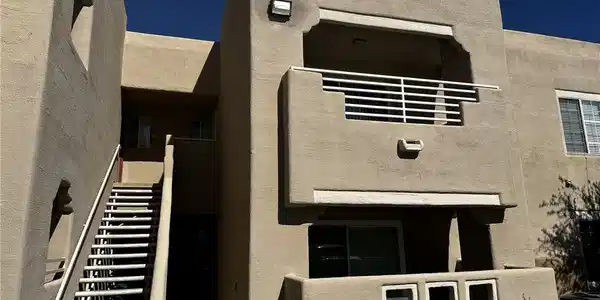 Image 2: Stucco exterior walls paired with architectural de